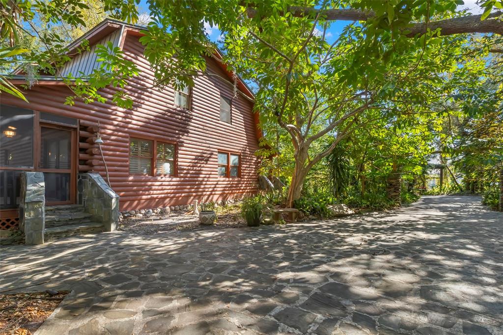 809 Cardinal Avenue Palm Harbor, FL 34683 - Photo 46 of 66 a view of a house with a yard