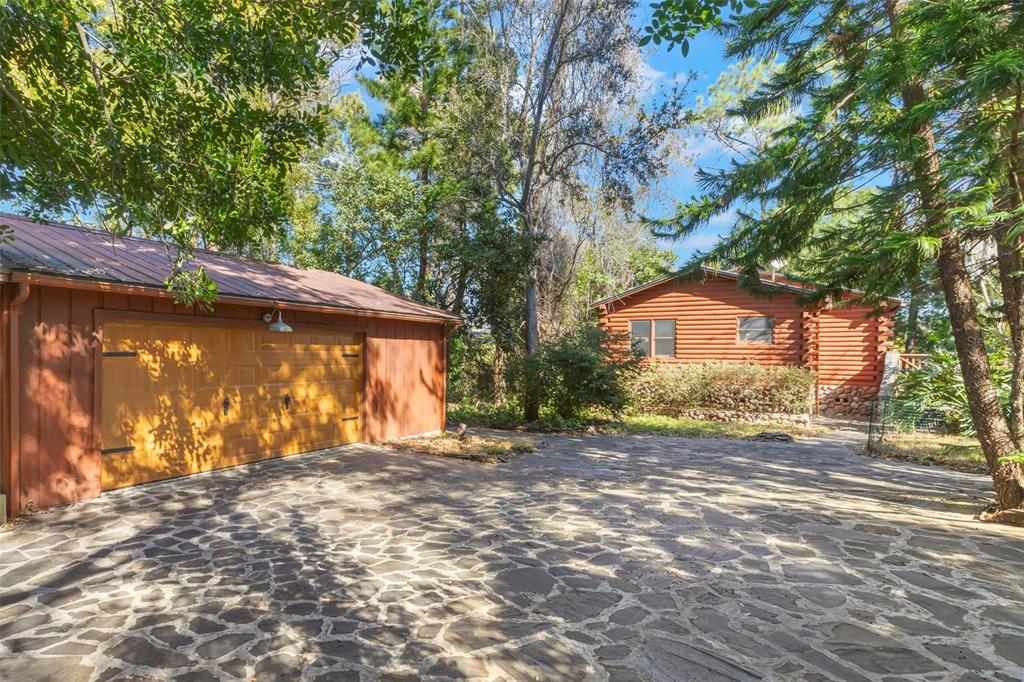 809 Cardinal Avenue Palm Harbor, FL 34683 - Photo 47 of 66 a view of a house with a yard