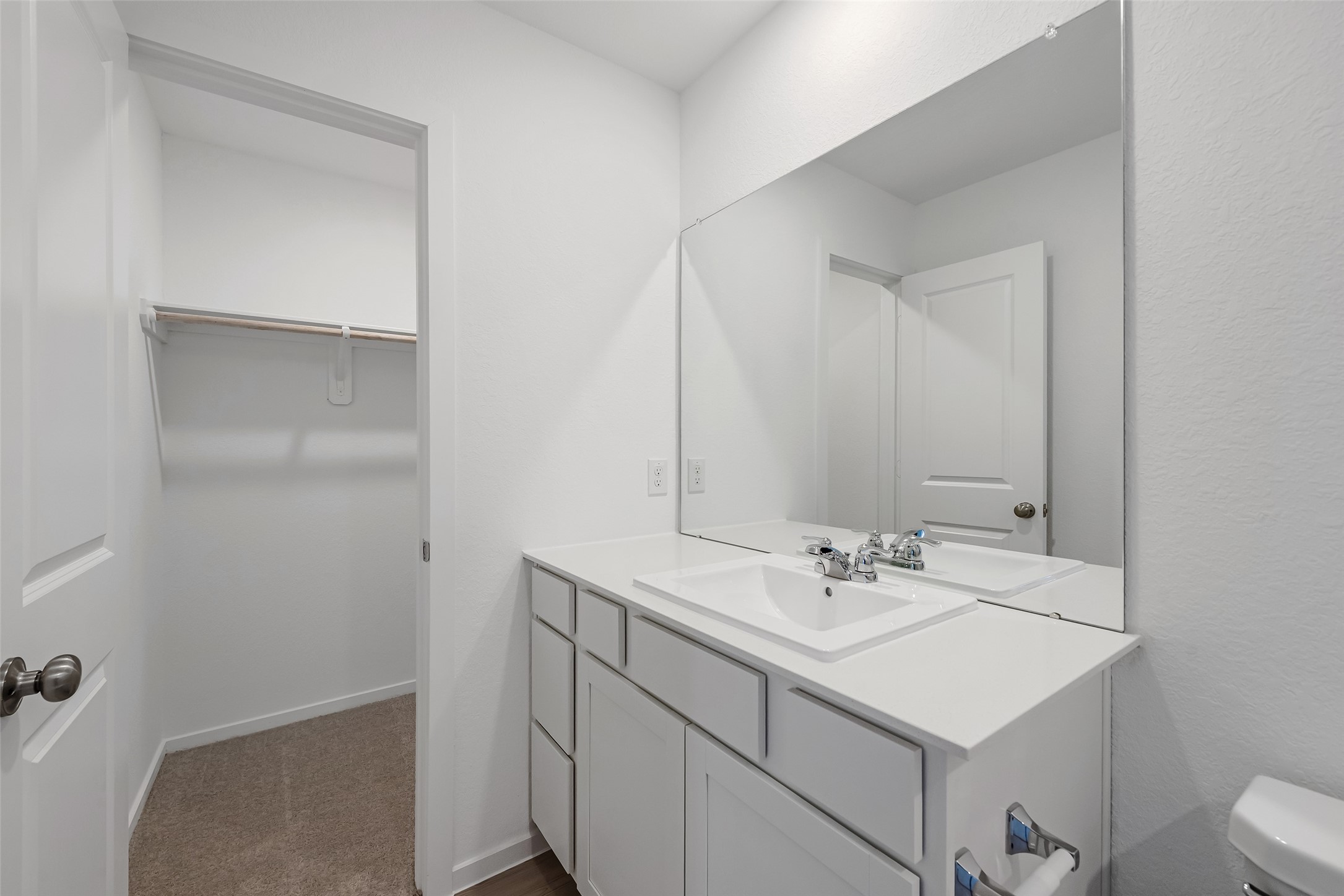 18739 Barrichello Drive Conroe, TX 77306 - Photo 11 of 15 a bathroom with a sink and a mirror