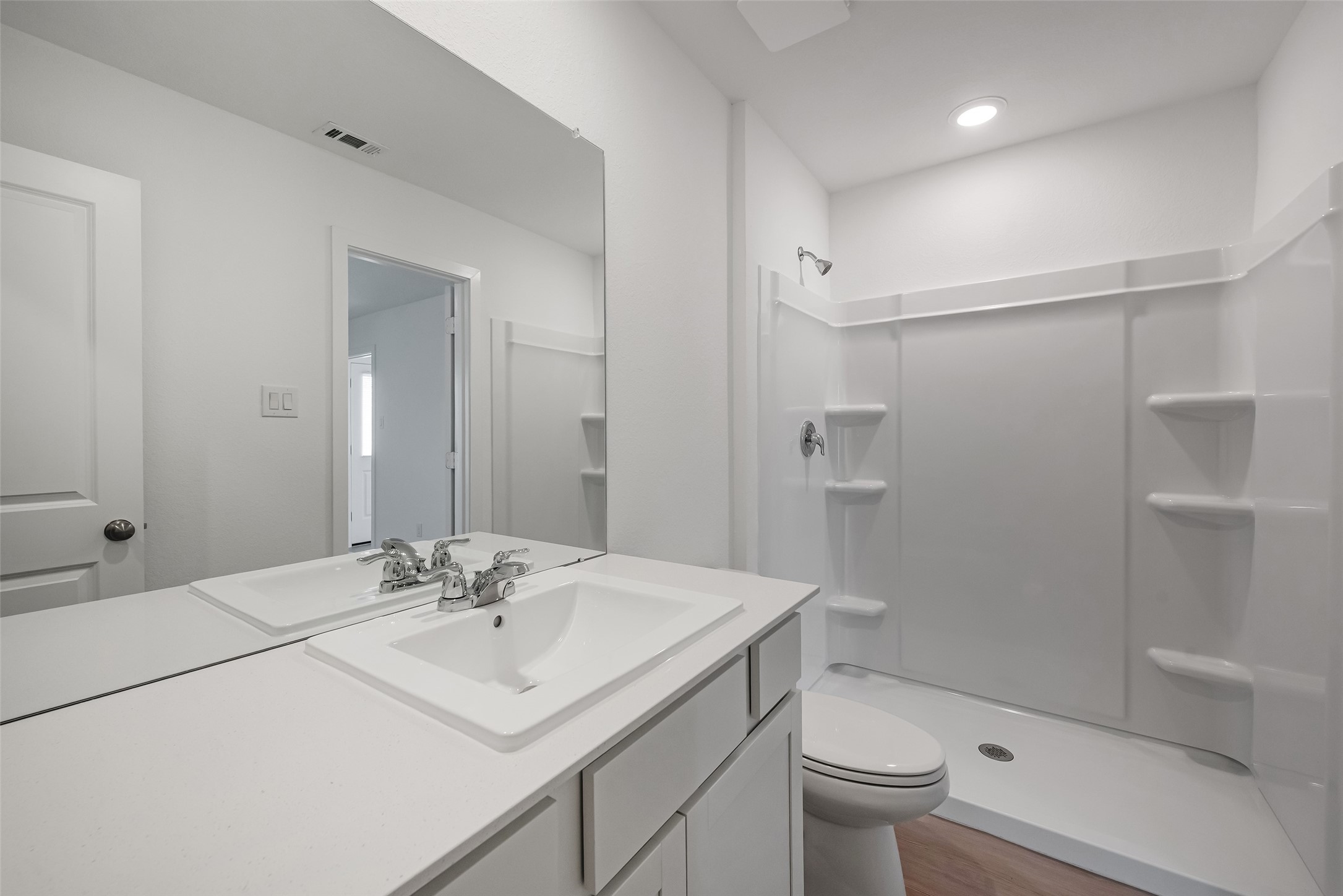 18739 Barrichello Drive Conroe, TX 77306 - Photo 12 of 15 a bathroom with a sink toilet and shower