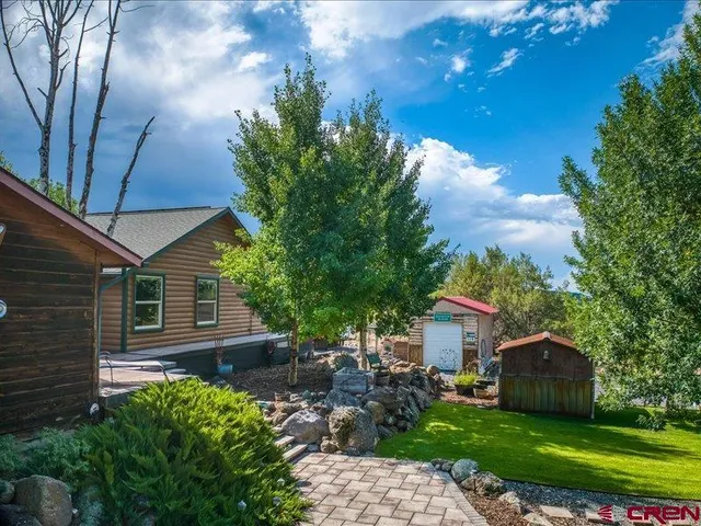 a view of a swimming pool with a patio