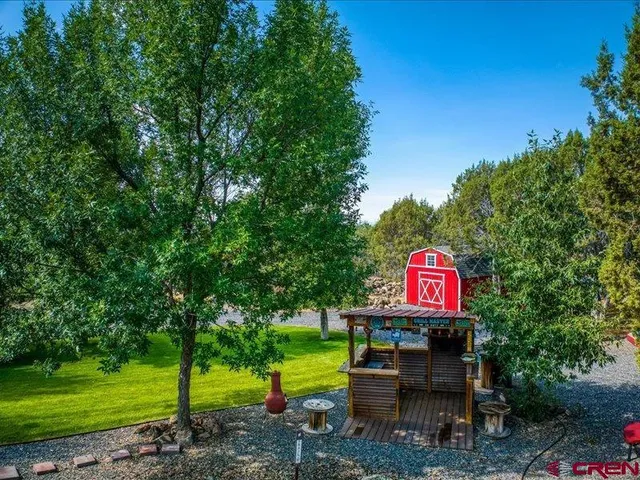 a view of a house with a garden