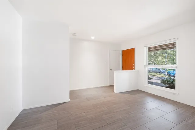 an empty room with windows