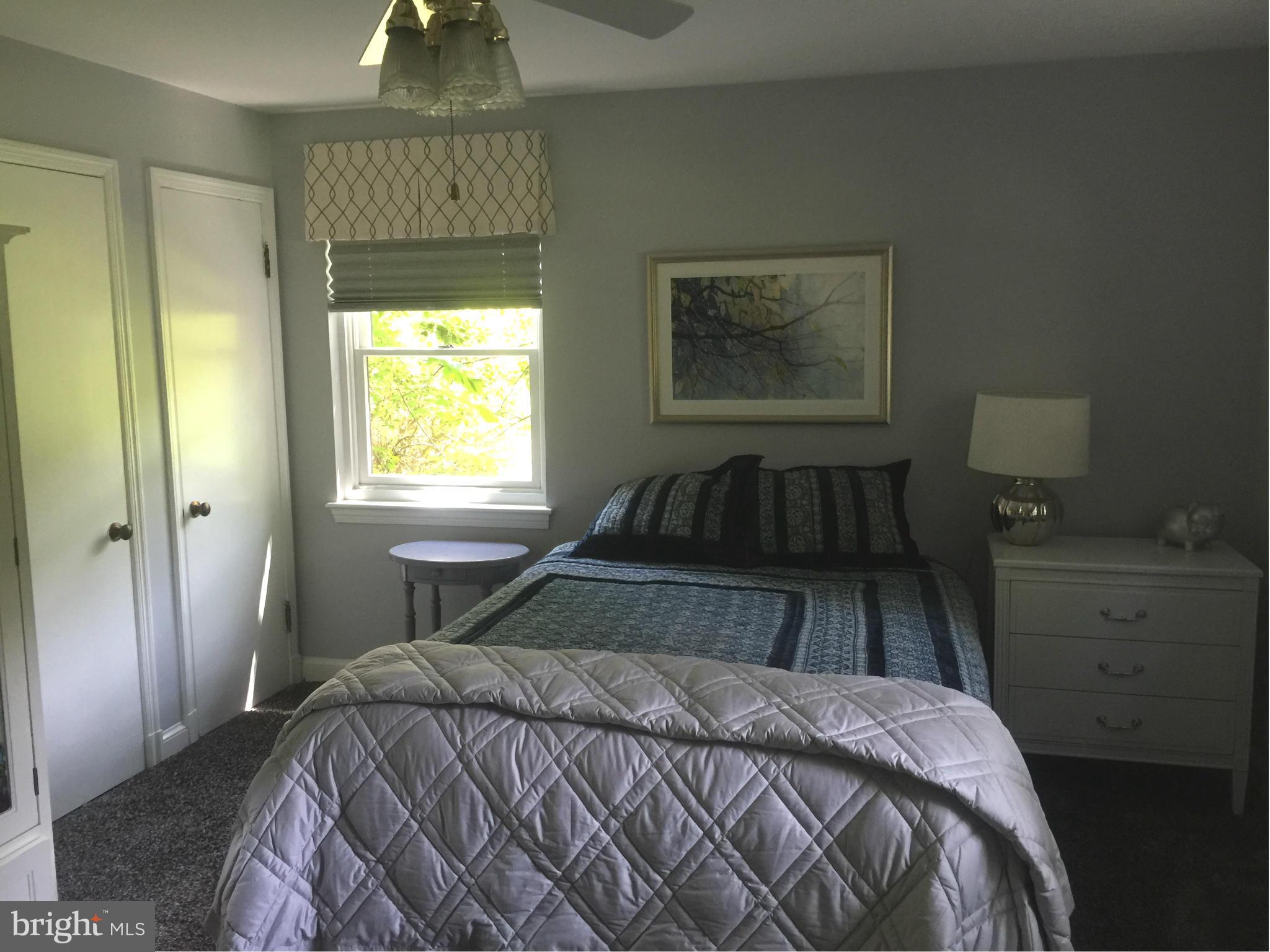 910 Notley Road Silver Spring, MD 20904 - Photo 24 of 28 a bedroom with a bed and a window