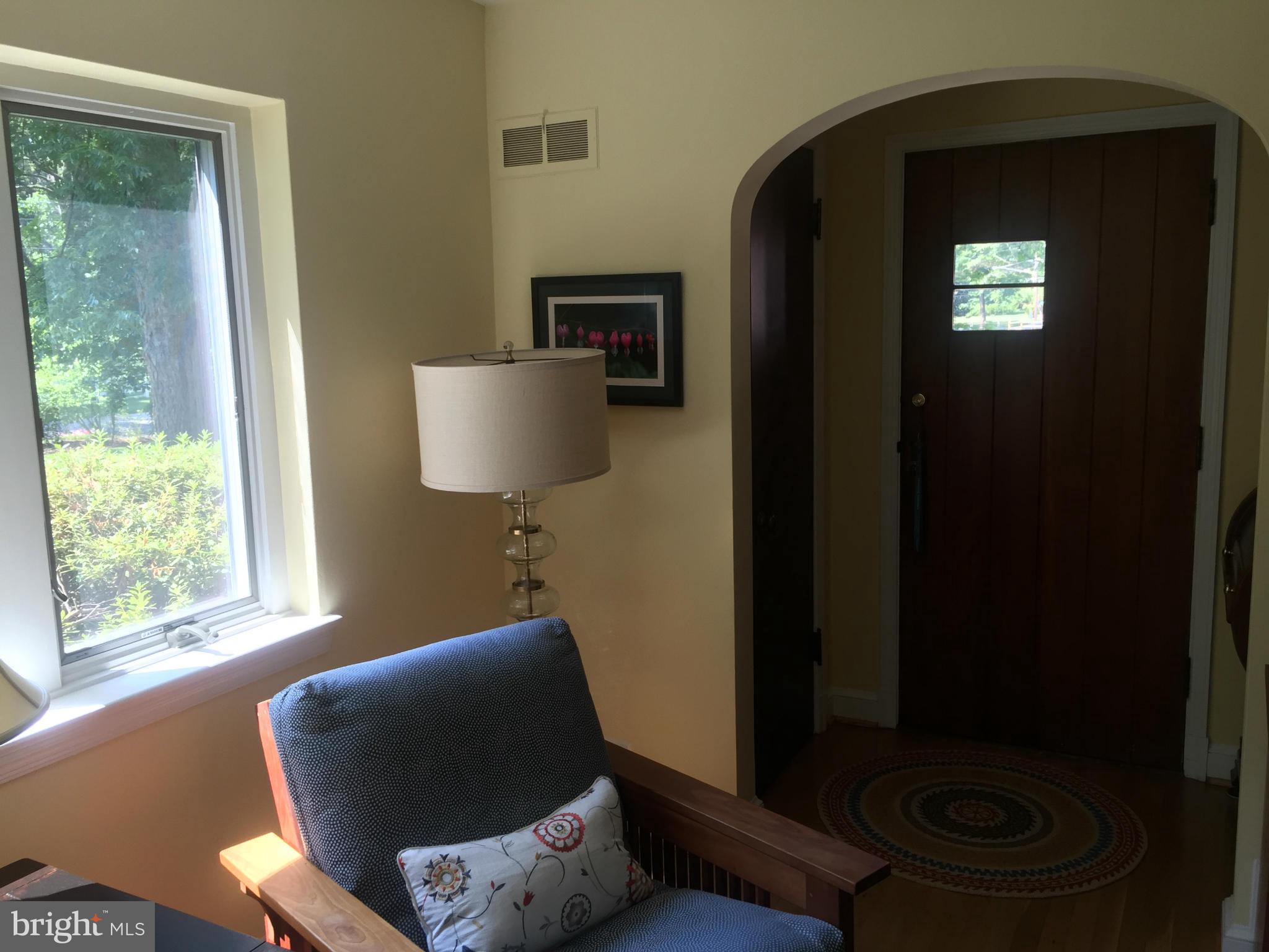 910 Notley Road Silver Spring, MD 20904 - Photo 7 of 28 a living room with furniture and a window