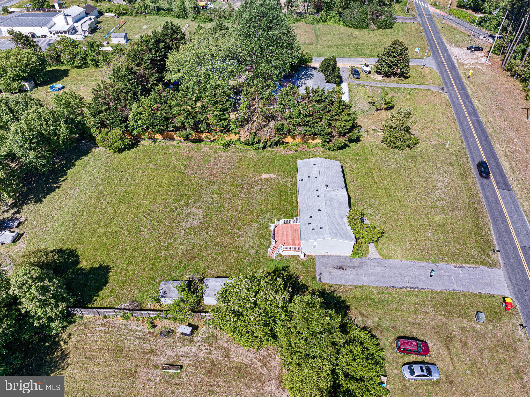 29044 Log Cabin Hill Road Lewes, DE 19958 - Photo 36 of 36 an aerial view of a house with a yard