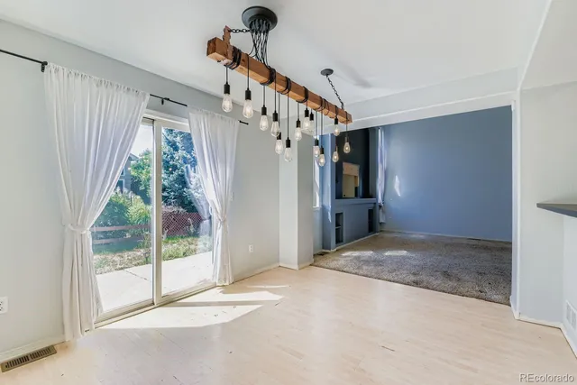 a kitchen with stainless steel appliances granite countertop a stove sink and cabinets