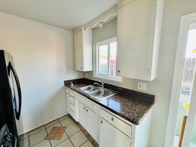 2045 Celeste Drive Modesto, CA 95355 - Photo 13 of 48 a kitchen with granite countertop a sink stove and refrigerator