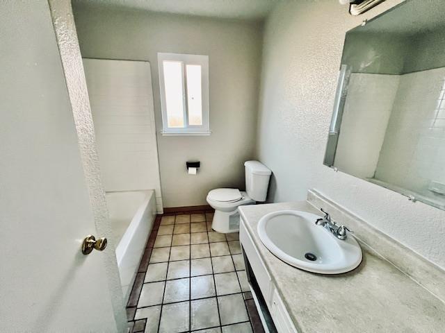 2045 Celeste Drive Modesto, CA 95355 - Photo 14 of 48 a bathroom with a sink toilet and a mirror