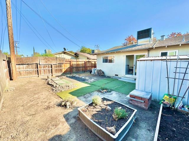 2045 Celeste Drive Modesto, CA 95355 - Photo 28 of 48 a view of a backyard with a patio