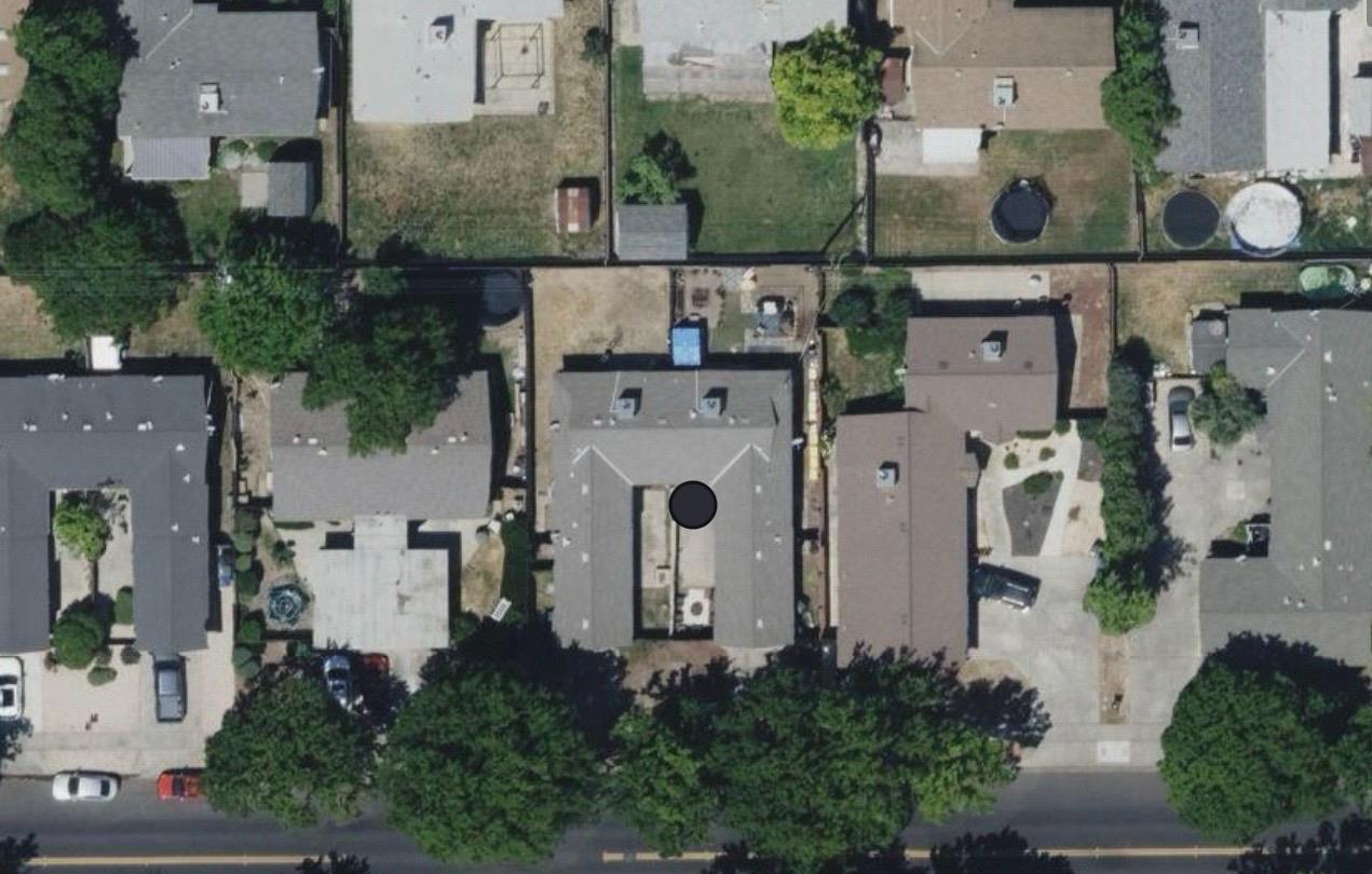 2045 Celeste Drive Modesto, CA 95355 - Photo 3 of 48 an aerial view of residential houses with outdoor space and parking