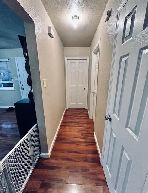 2045 Celeste Drive Modesto, CA 95355 - Photo 35 of 48 a view of a hallway with wooden floor and staircase