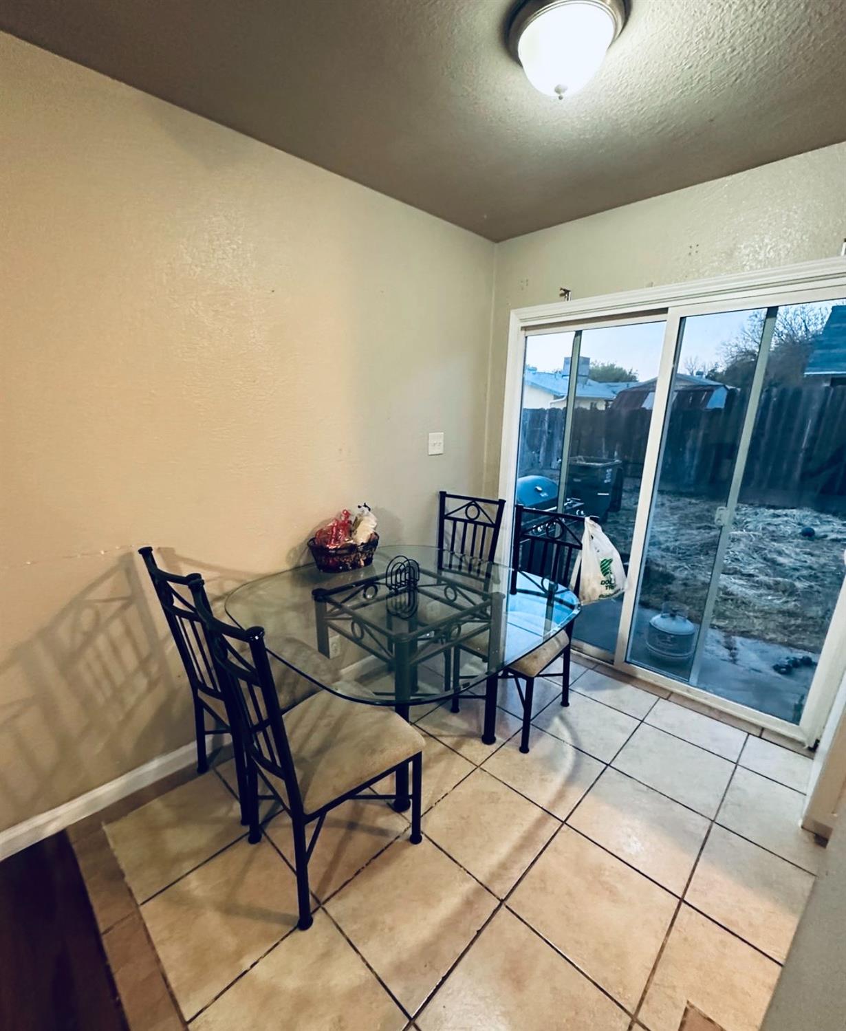 2045 Celeste Drive Modesto, CA 95355 - Photo 39 of 48 a view of a room with furniture and a potted plant