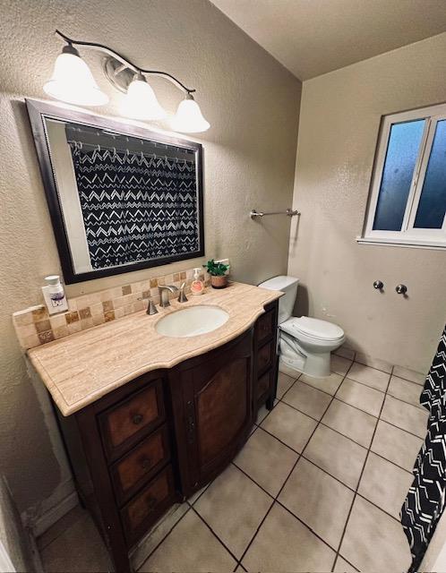 2045 Celeste Drive Modesto, CA 95355 - Photo 40 of 48 a bathroom with a sink and a mirror