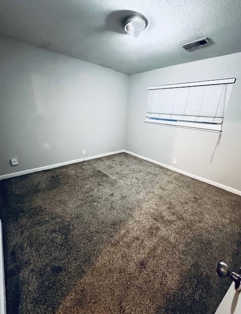 2045 Celeste Drive Modesto, CA 95355 - Photo 42 of 48 an empty room with windows