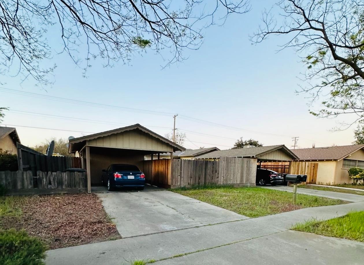 2045 Celeste Drive Modesto, CA 95355 - Photo 48 of 48 a view of a house with a yard and sitting area