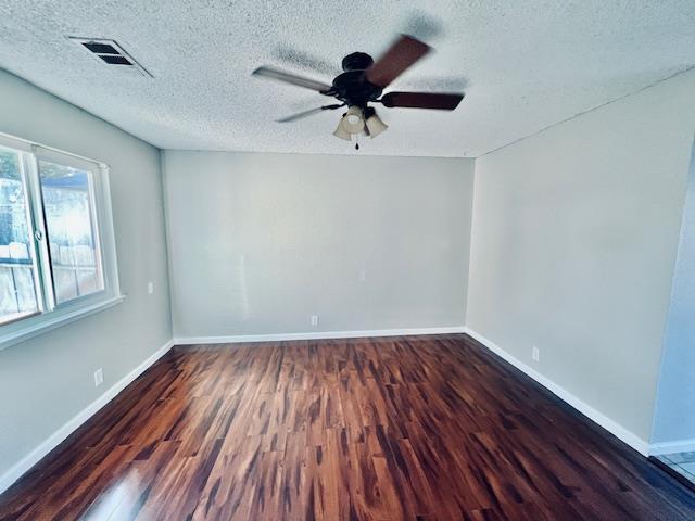 2045 Celeste Drive Modesto, CA 95355 - Photo 7 of 48 wooden floor in an empty room with a window
