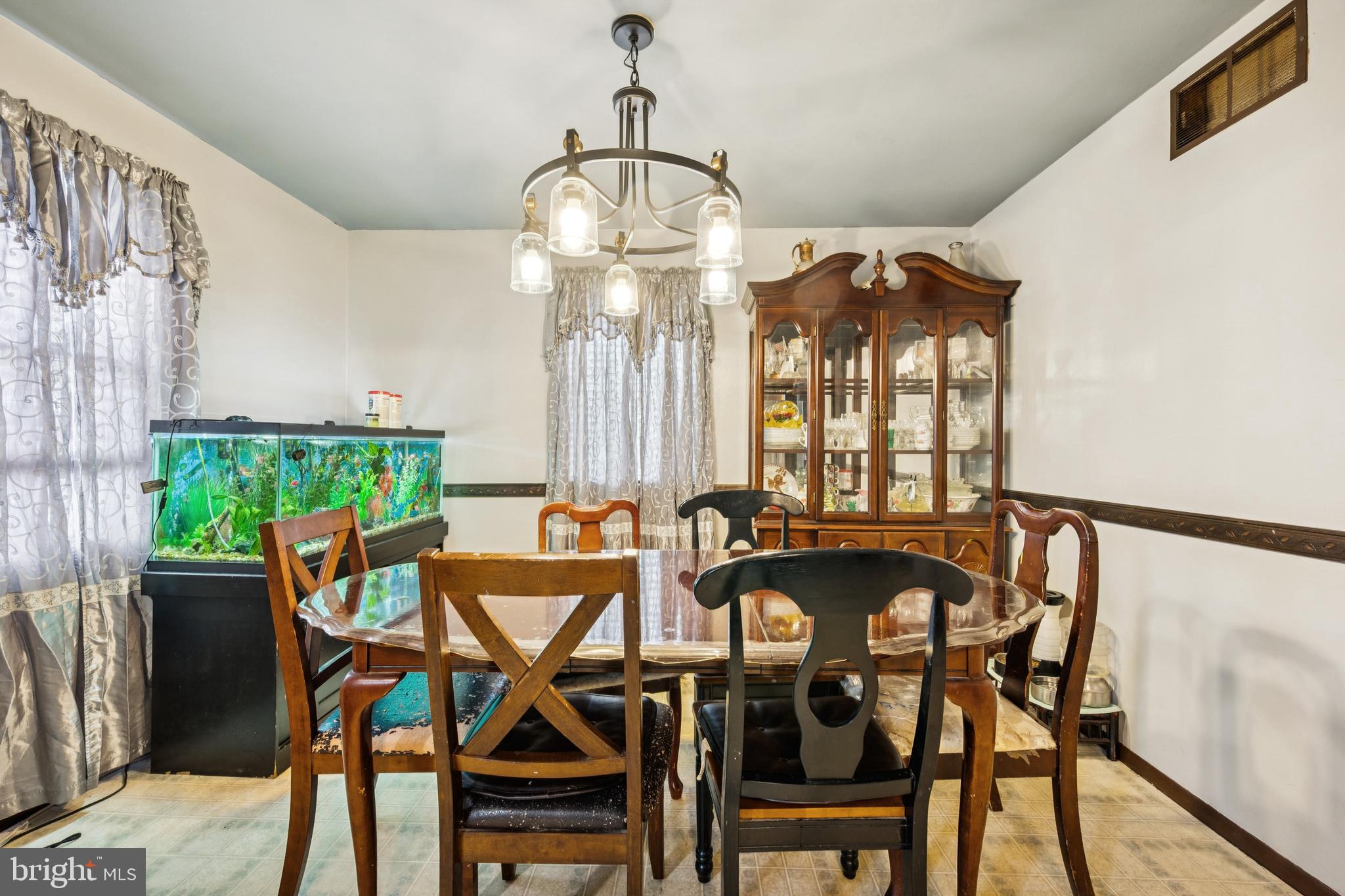 609 8th Avenue Lindenwold, NJ 08021 - Photo 16 of 25 a view of a dining room with furniture window and outside view