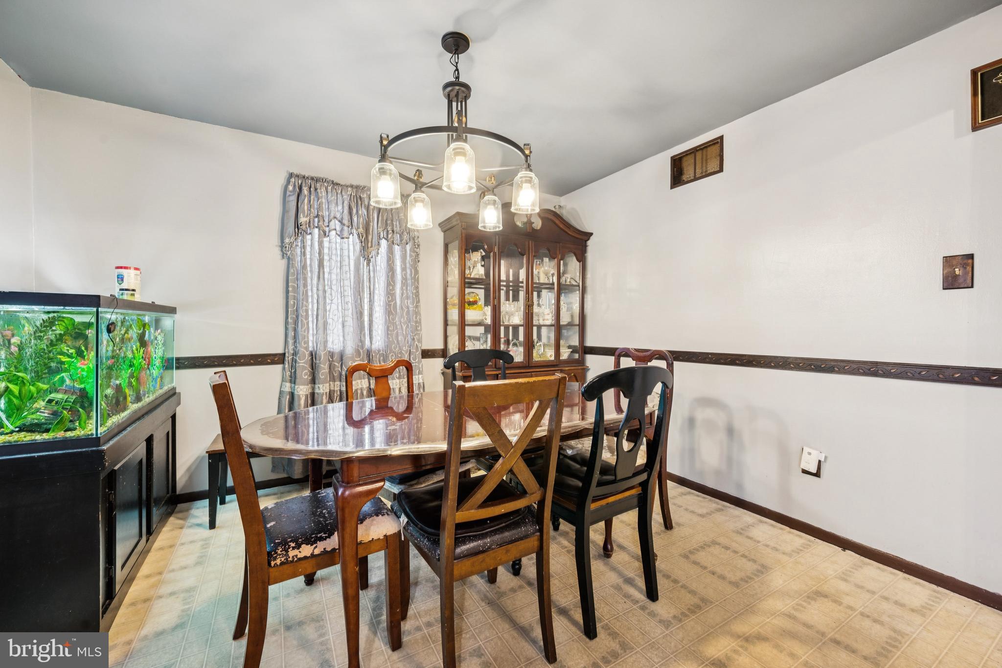 609 8th Avenue Lindenwold, NJ 08021 - Photo 17 of 25 a view of a dining room with furniture window and outside view