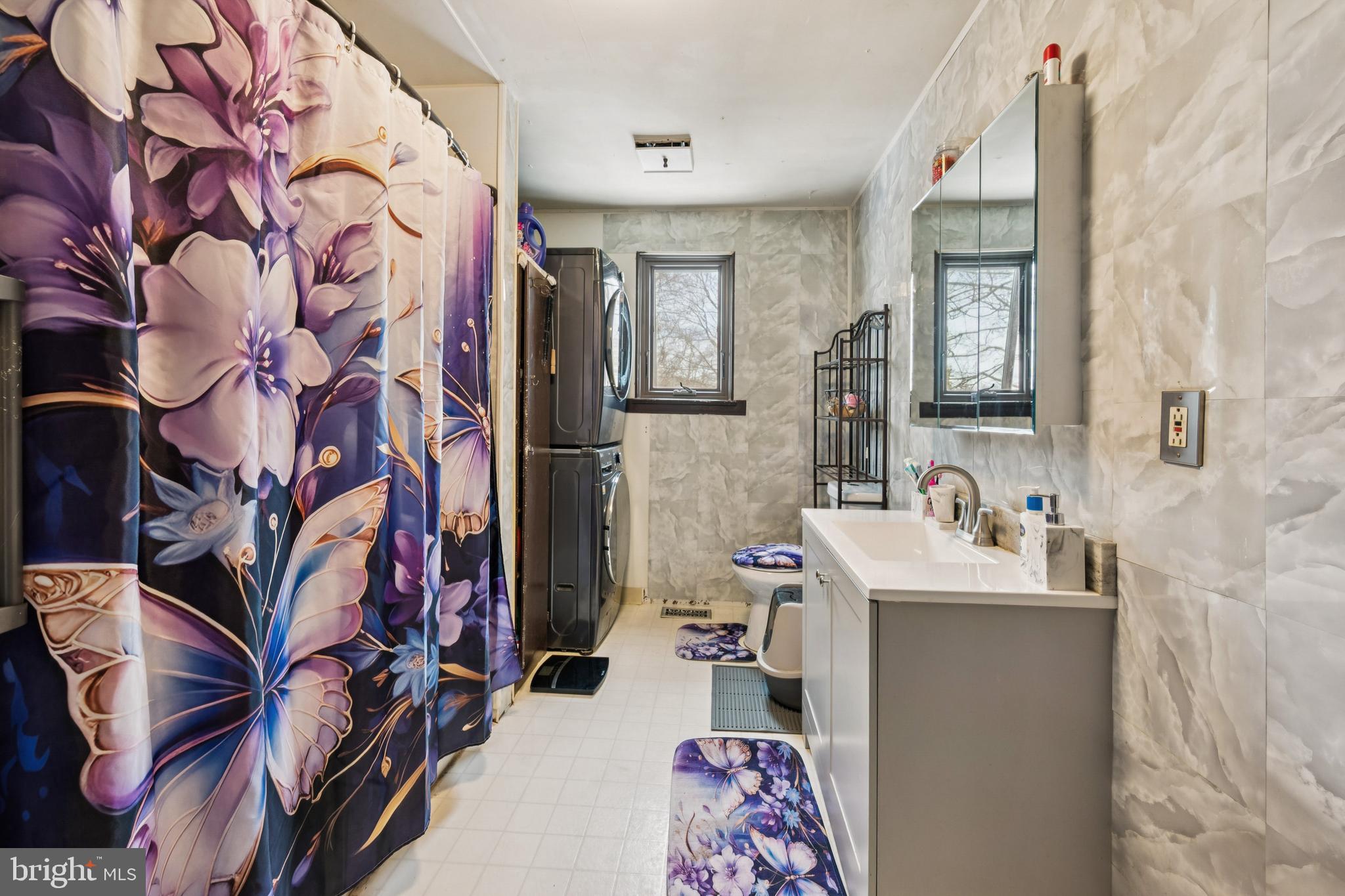609 8th Avenue Lindenwold, NJ 08021 - Photo 18 of 25 a bathroom with a sink and mirror with toilet
