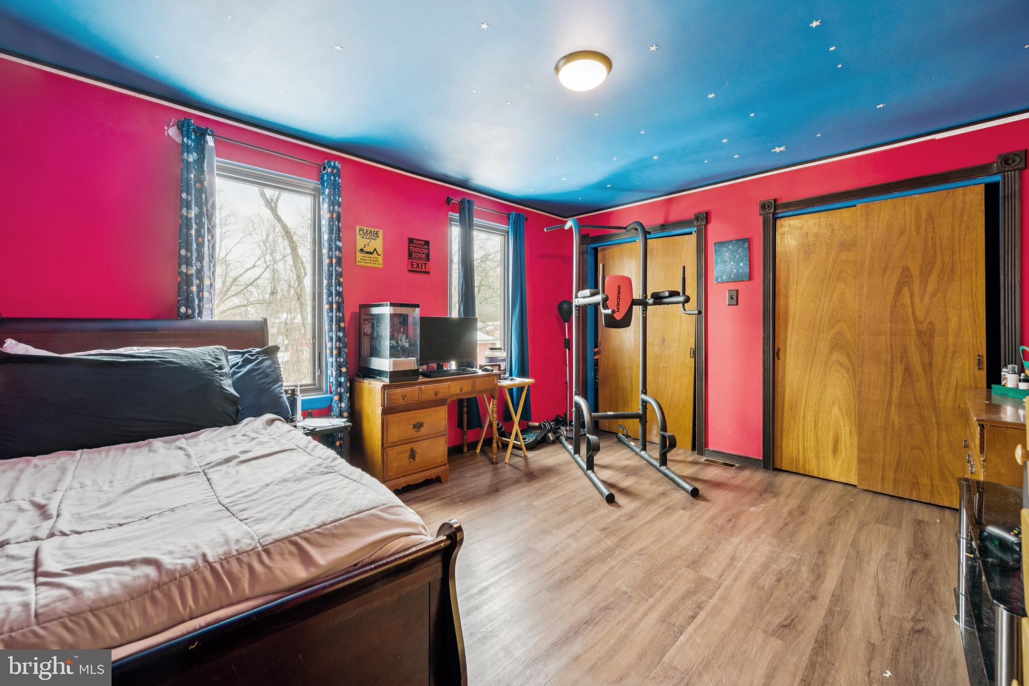 609 8th Avenue Lindenwold, NJ 08021 - Photo 19 of 25 a bedroom with a bed and a dresser next to a window