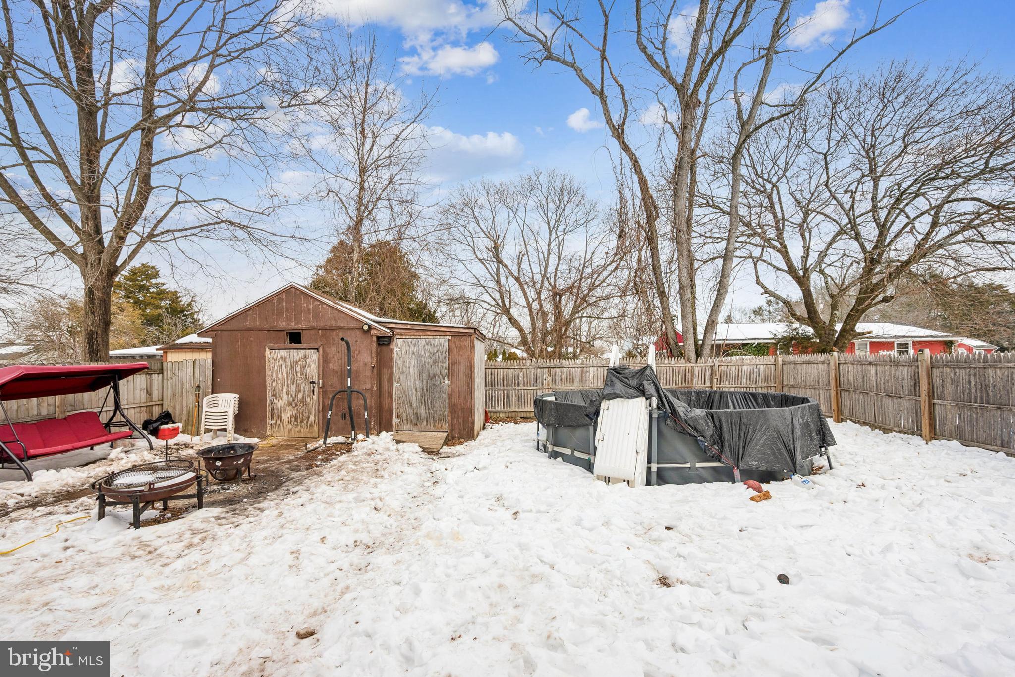 609 8th Avenue Lindenwold, NJ 08021 - Photo 23 of 25 a street view covered with snow