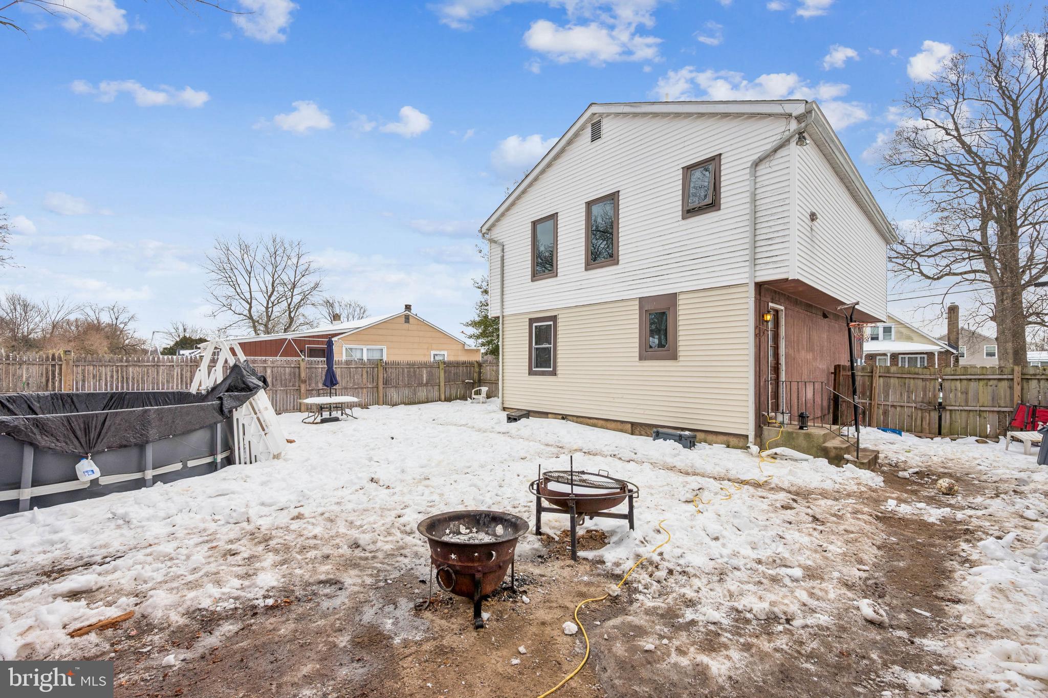 609 8th Avenue Lindenwold, NJ 08021 - Photo 24 of 25 a view of a white house with a yard