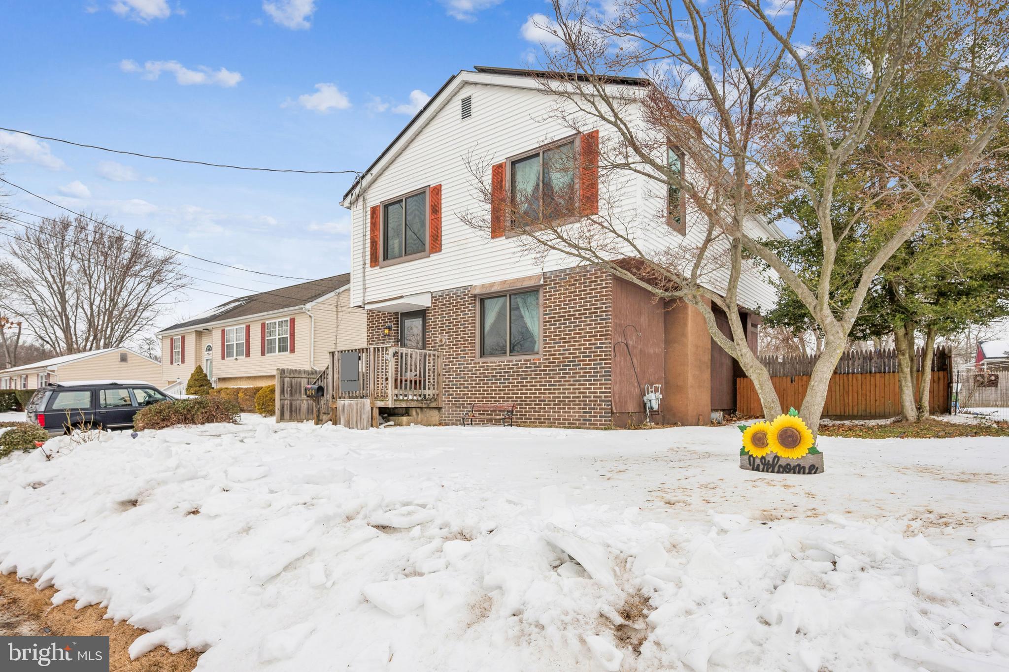609 8th Avenue Lindenwold, NJ 08021 - Photo 3 of 25 a view of a building with snow on the road