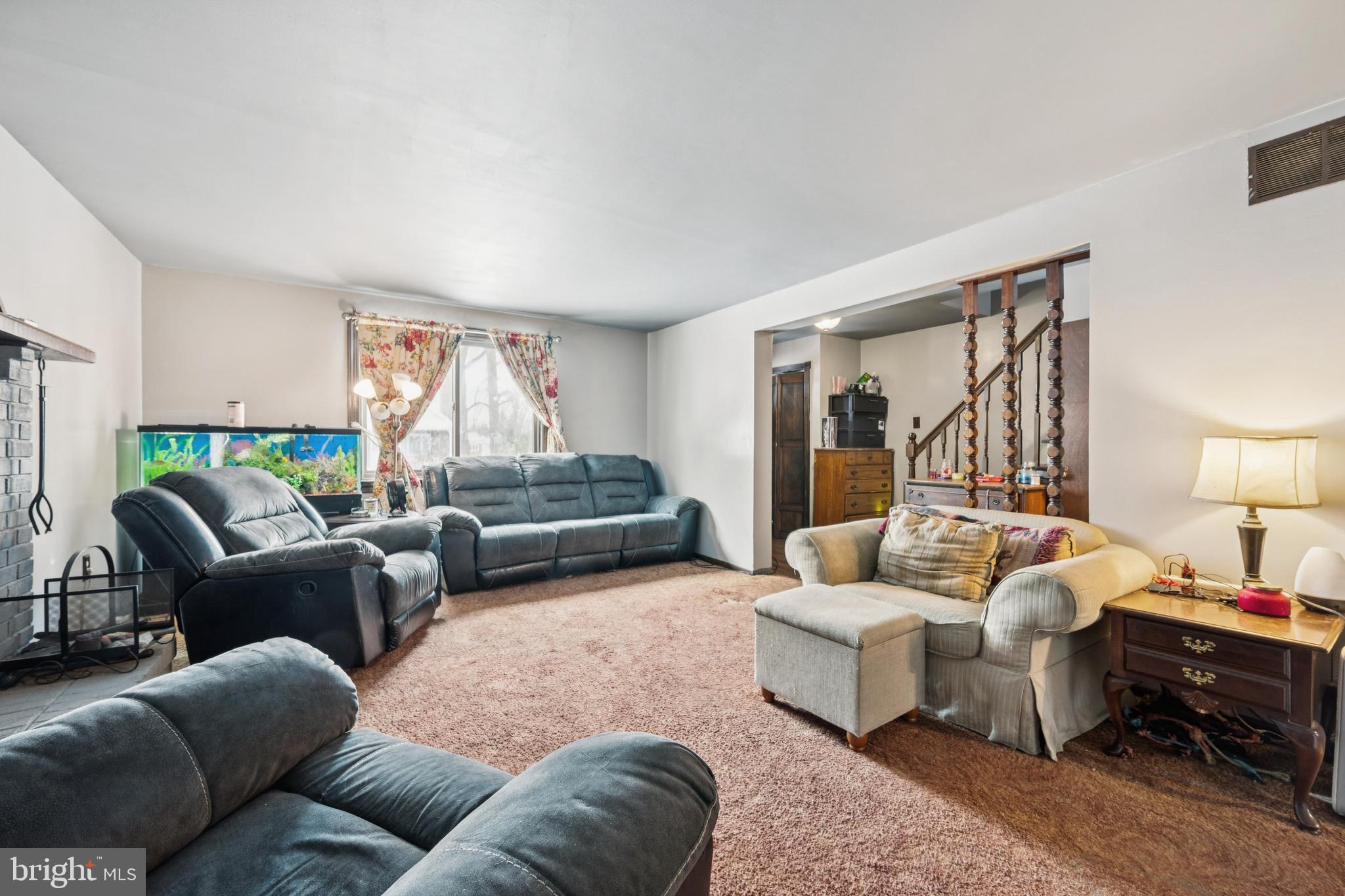609 8th Avenue Lindenwold, NJ 08021 - Photo 10 of 25 a living room with furniture and a large window