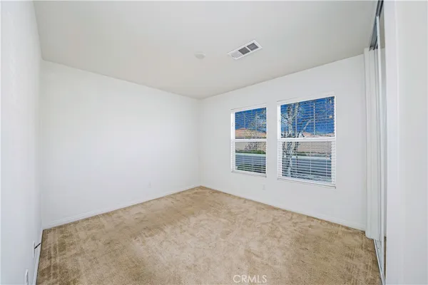 a view of a room with a window
