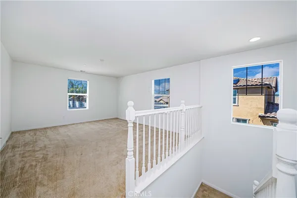 a view of livingroom with furniture and windows