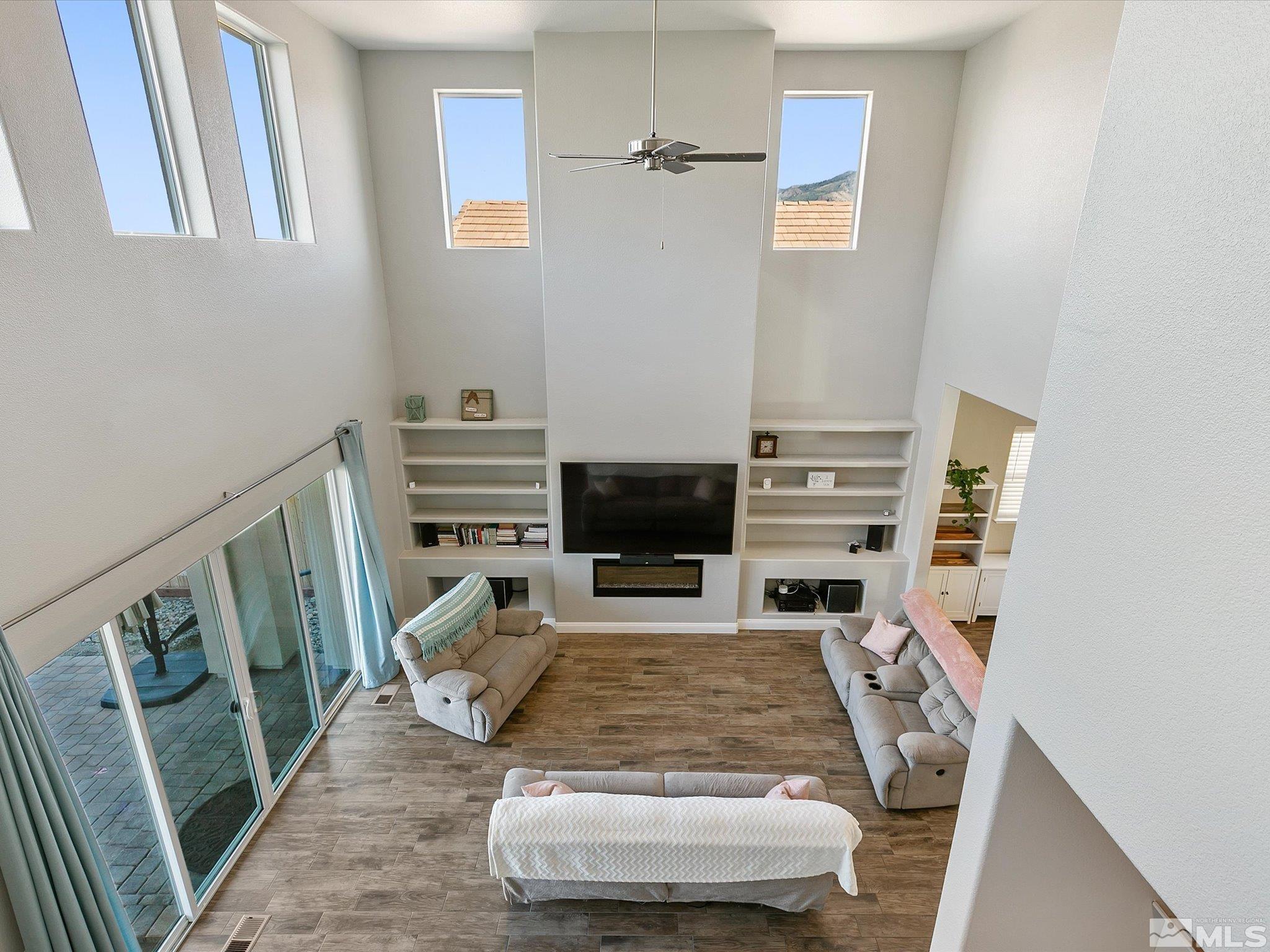 1564 Elk Run Trail Reno, NV 89523 - Photo 8 of 18 a living room with furniture and a fireplace