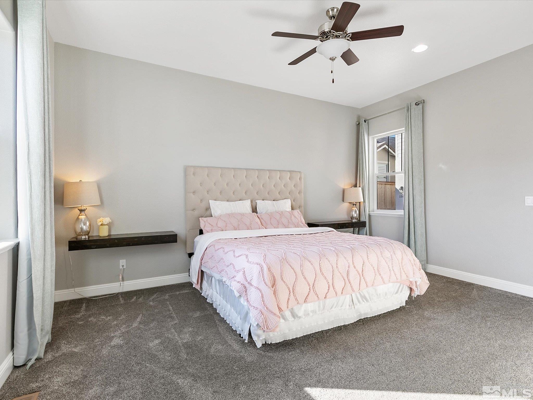 1564 Elk Run Trail Reno, NV 89523 - Photo 9 of 18 a bedroom with a bed and window