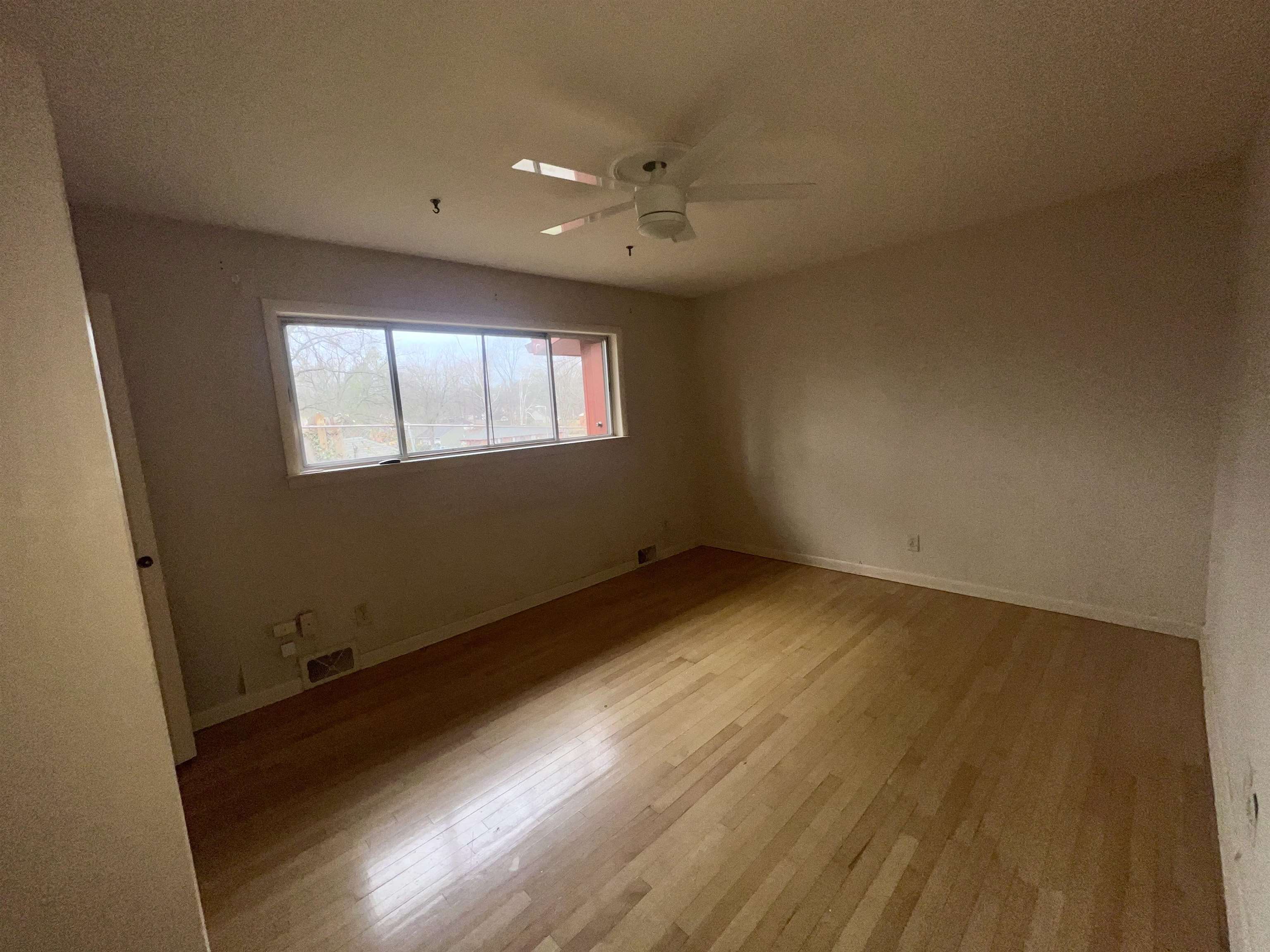 3153 Kirkcaldy Road Memphis, TN 38128 - Photo 15 of 28 Spare room featuring light wood-style flooring and ceiling fan