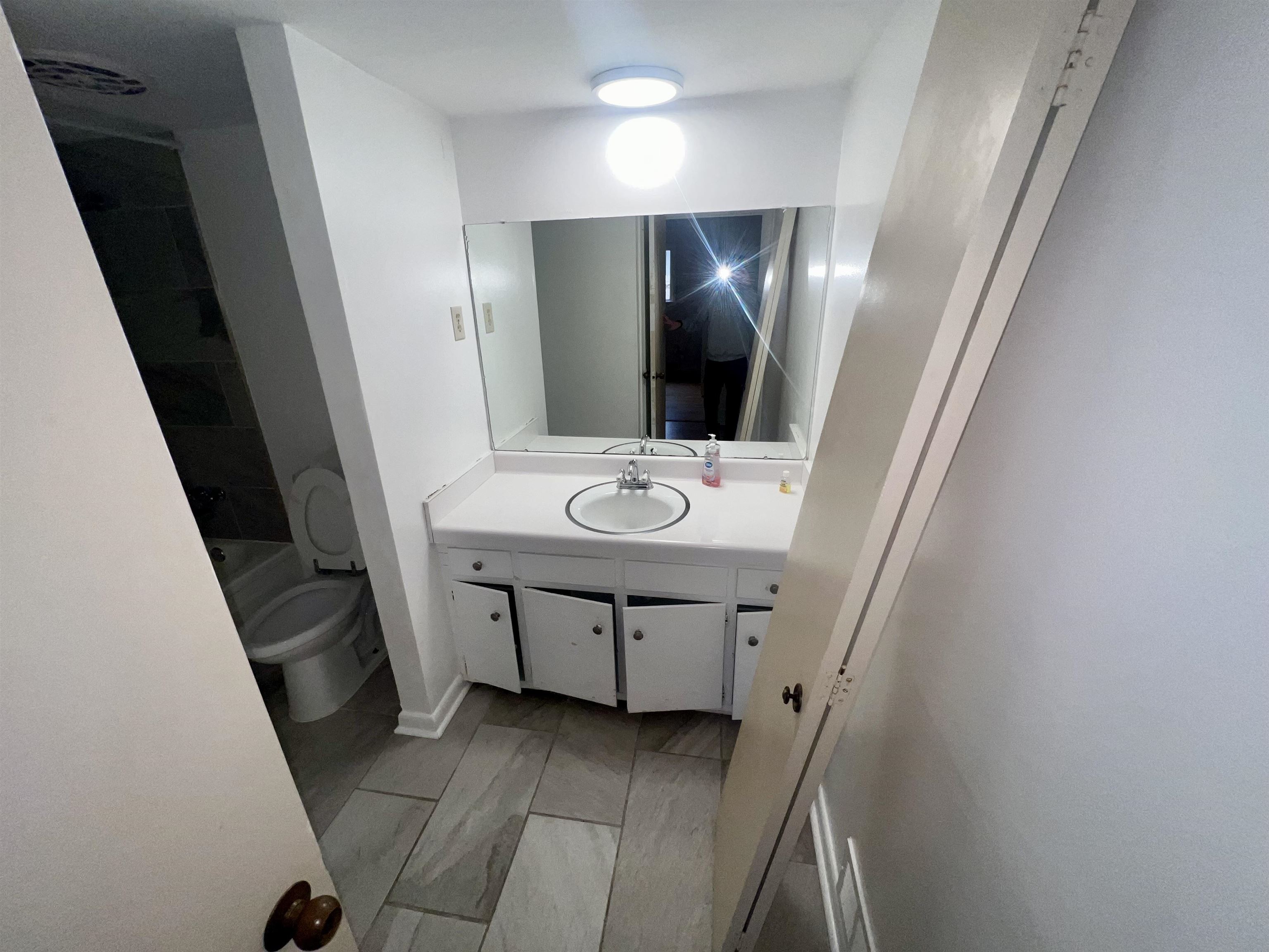 3153 Kirkcaldy Road Memphis, TN 38128 - Photo 26 of 28 Full bathroom featuring vanity and shower combination