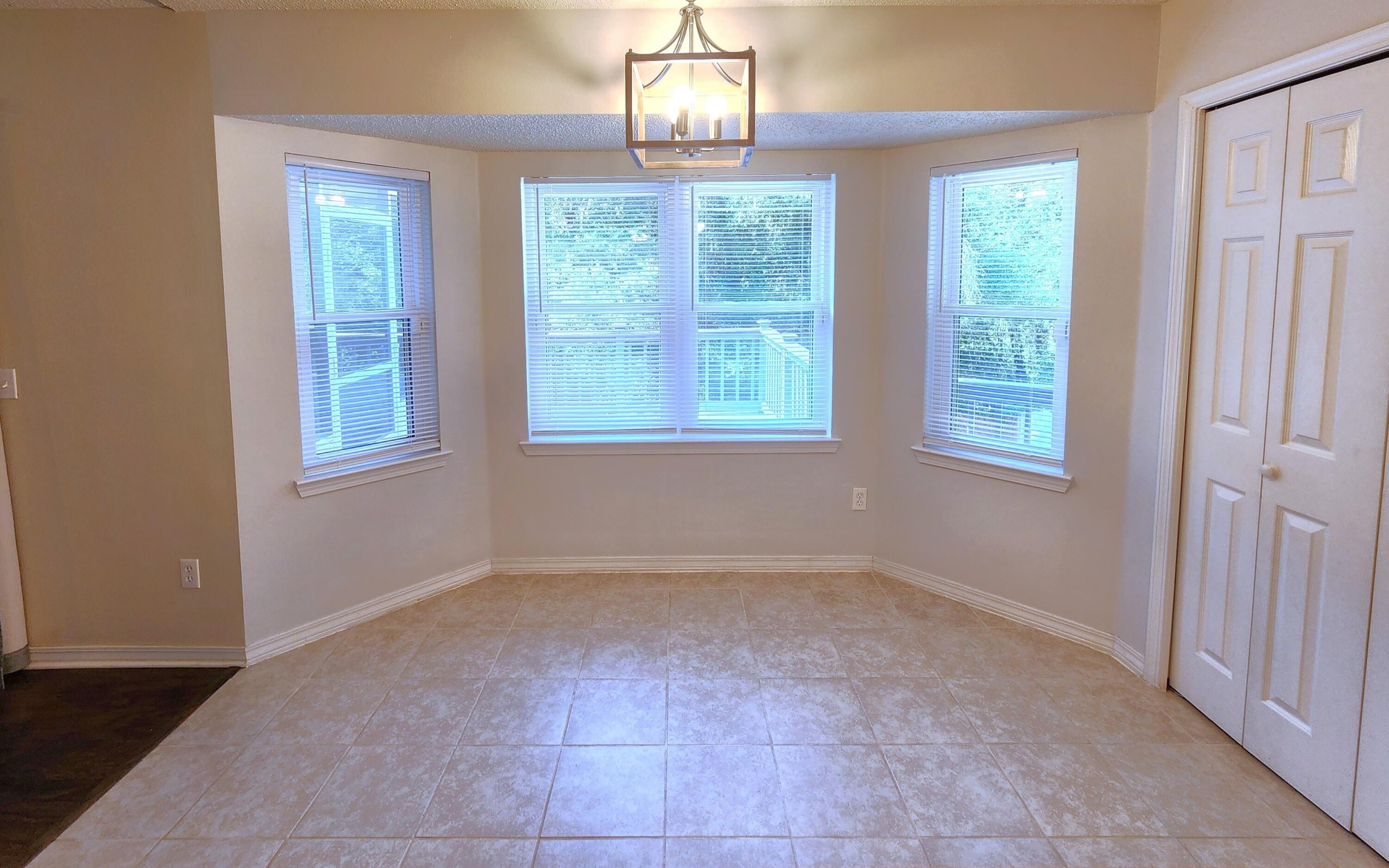 316 Egan Drive Crestview, FL 32536 - Photo 14 of 32 an empty room that has a window