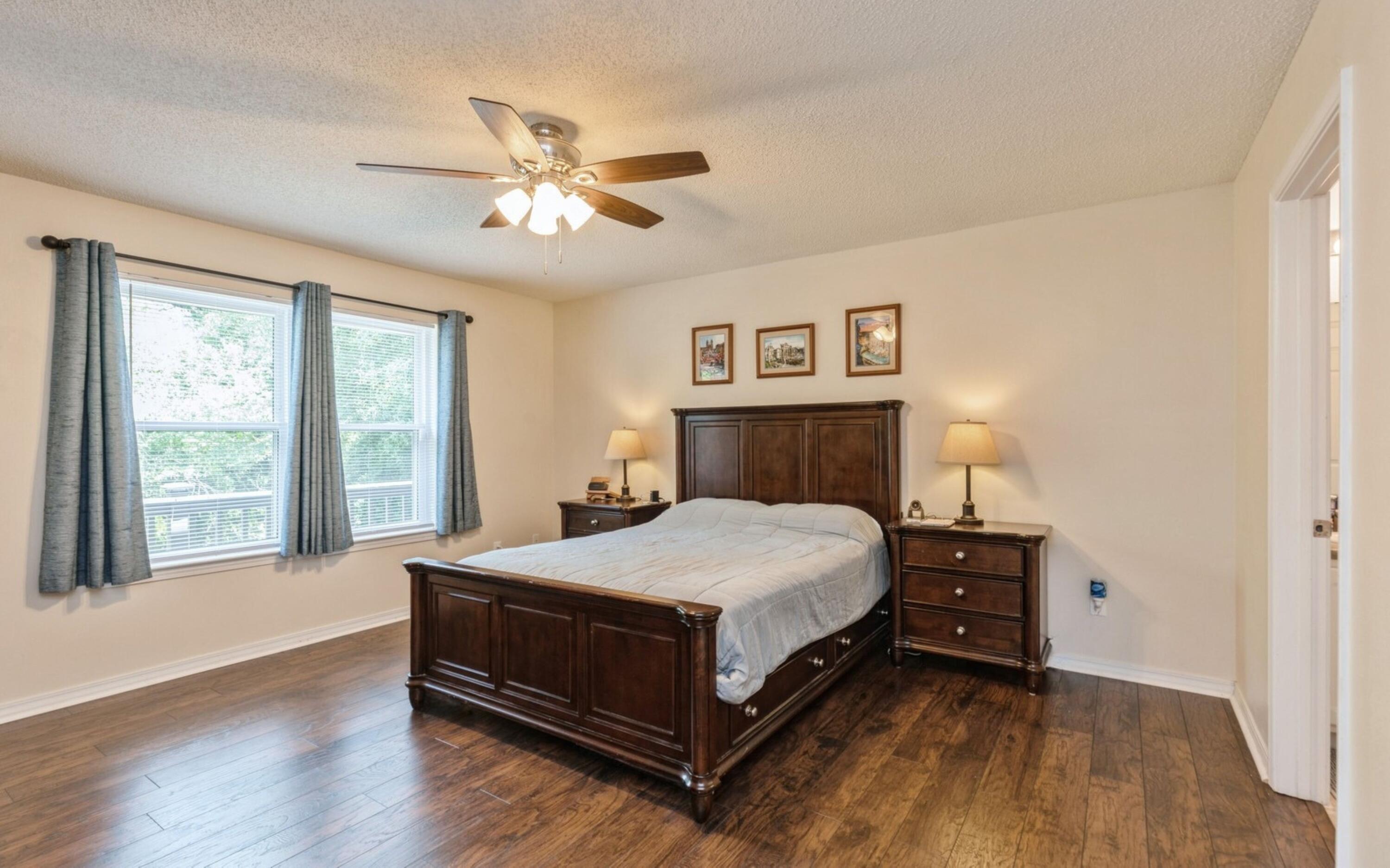 316 Egan Drive Crestview, FL 32536 - Photo 15 of 32 a spacious bedroom with a bed and a large window