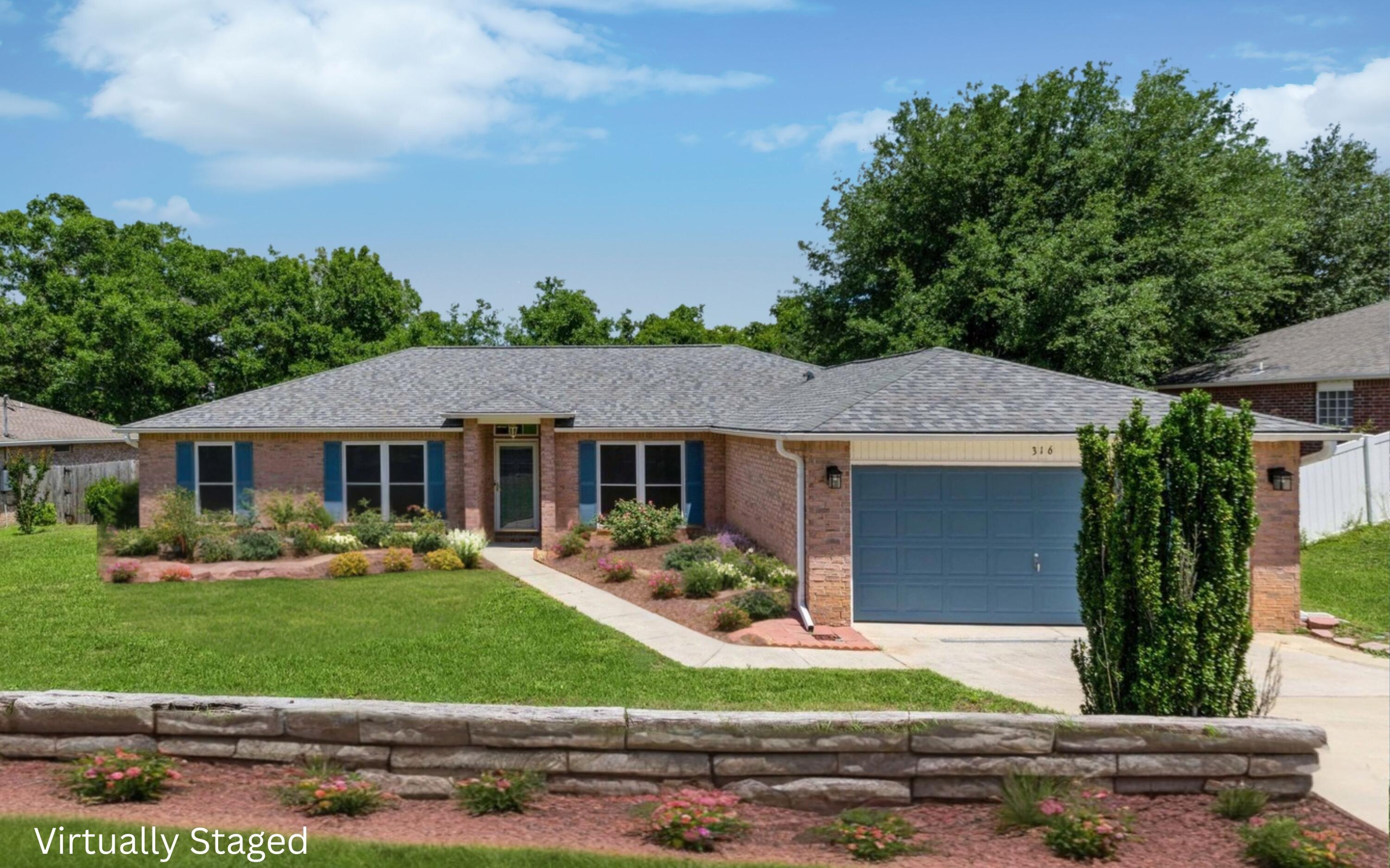 316 Egan Drive Crestview, FL 32536 - Photo 2 of 32 front view of a house with a yard