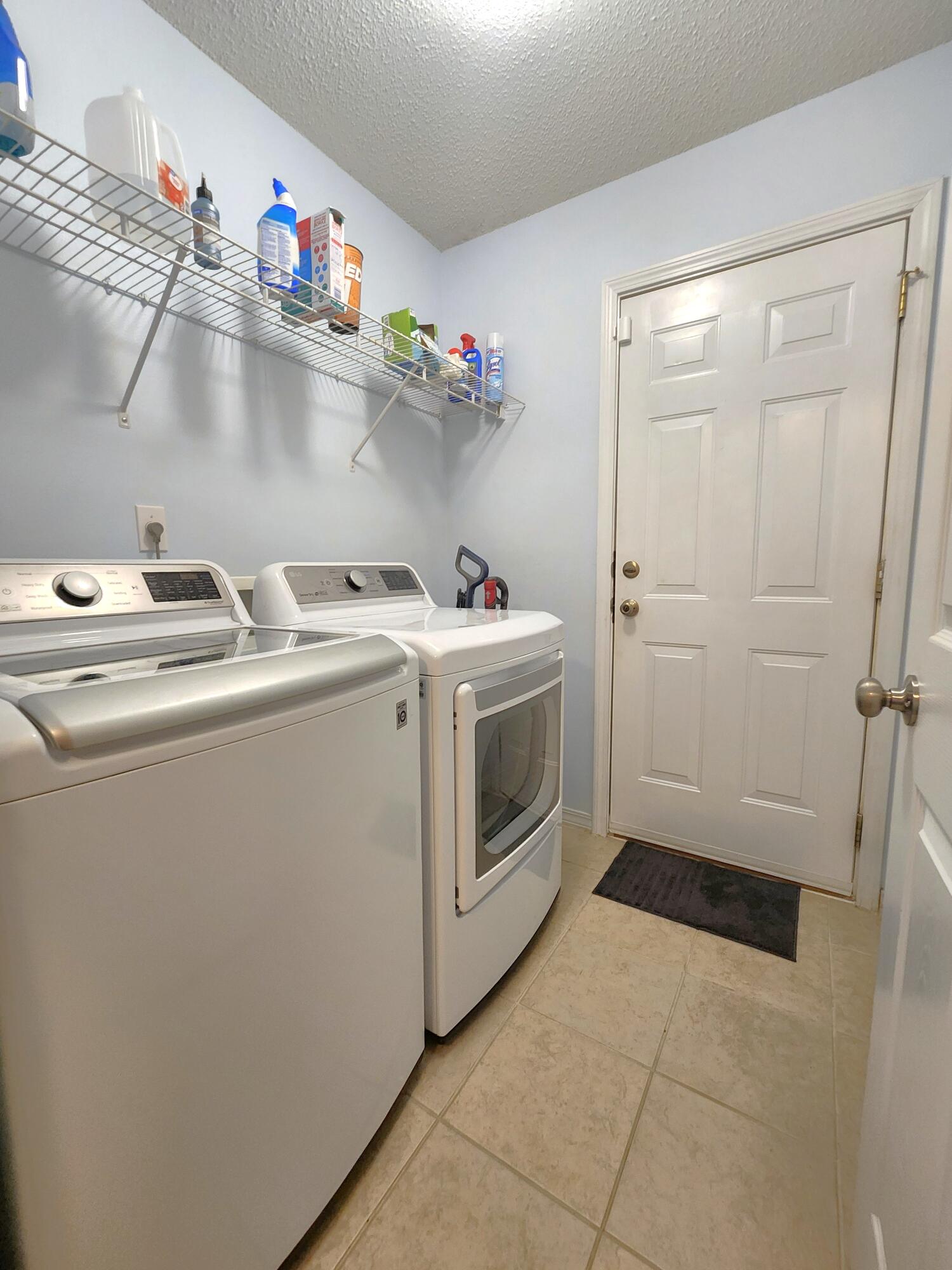 316 Egan Drive Crestview, FL 32536 - Photo 25 of 32 a utility room with dryer and washer