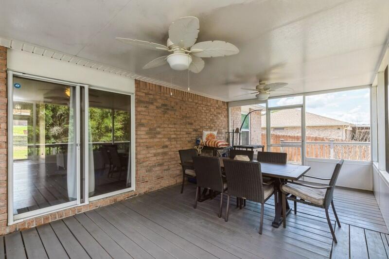 316 Egan Drive Crestview, FL 32536 - Photo 27 of 32 a view of a dining room with furniture window and wooden floor
