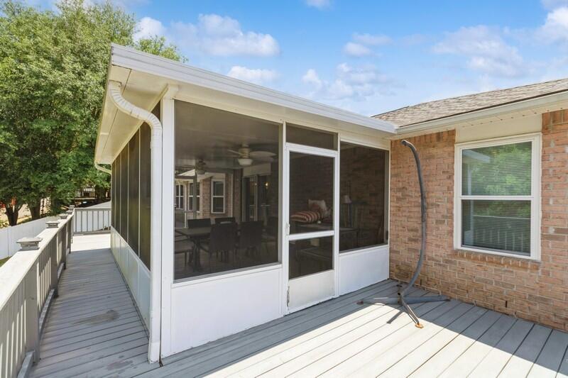 316 Egan Drive Crestview, FL 32536 - Photo 28 of 32 a view of a house with a glass door