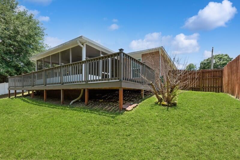 316 Egan Drive Crestview, FL 32536 - Photo 29 of 32 a view of a house with a yard and sitting area