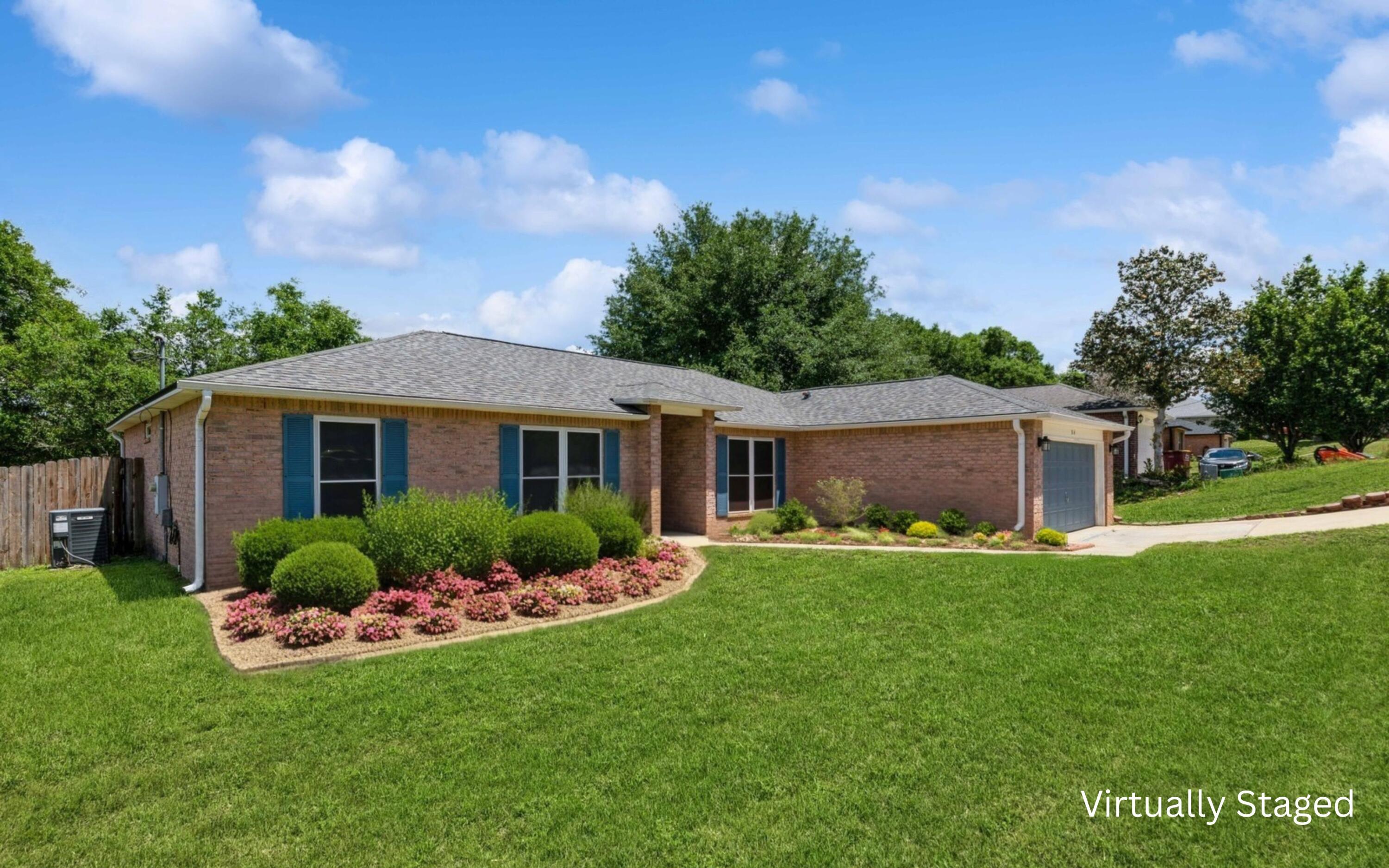 316 Egan Drive Crestview, FL 32536 - Photo 4 of 32 a front view of house with yard and green space