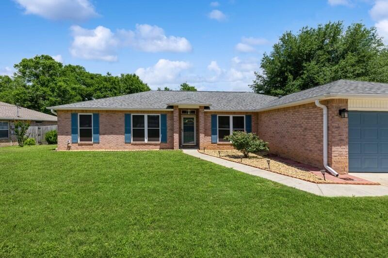 316 Egan Drive Crestview, FL 32536 - Photo 5 of 32 a view of a house with a backyard