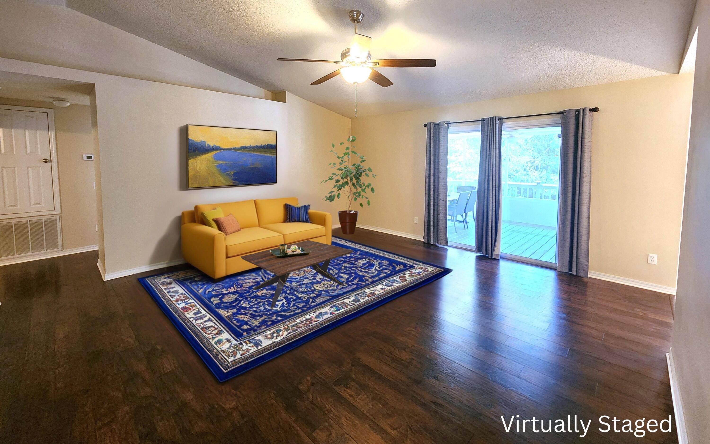 316 Egan Drive Crestview, FL 32536 - Photo 8 of 32 a living room with furniture and a rug