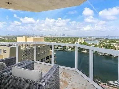 a balcony with a city view