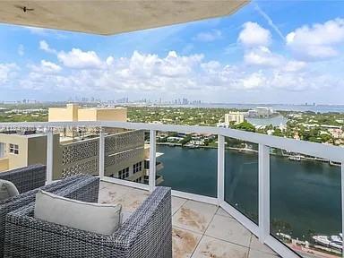 4775 Collins Avenue, Unit 2105 Miami Beach, FL 33140 - Photo 4 of 21 a balcony with a city view