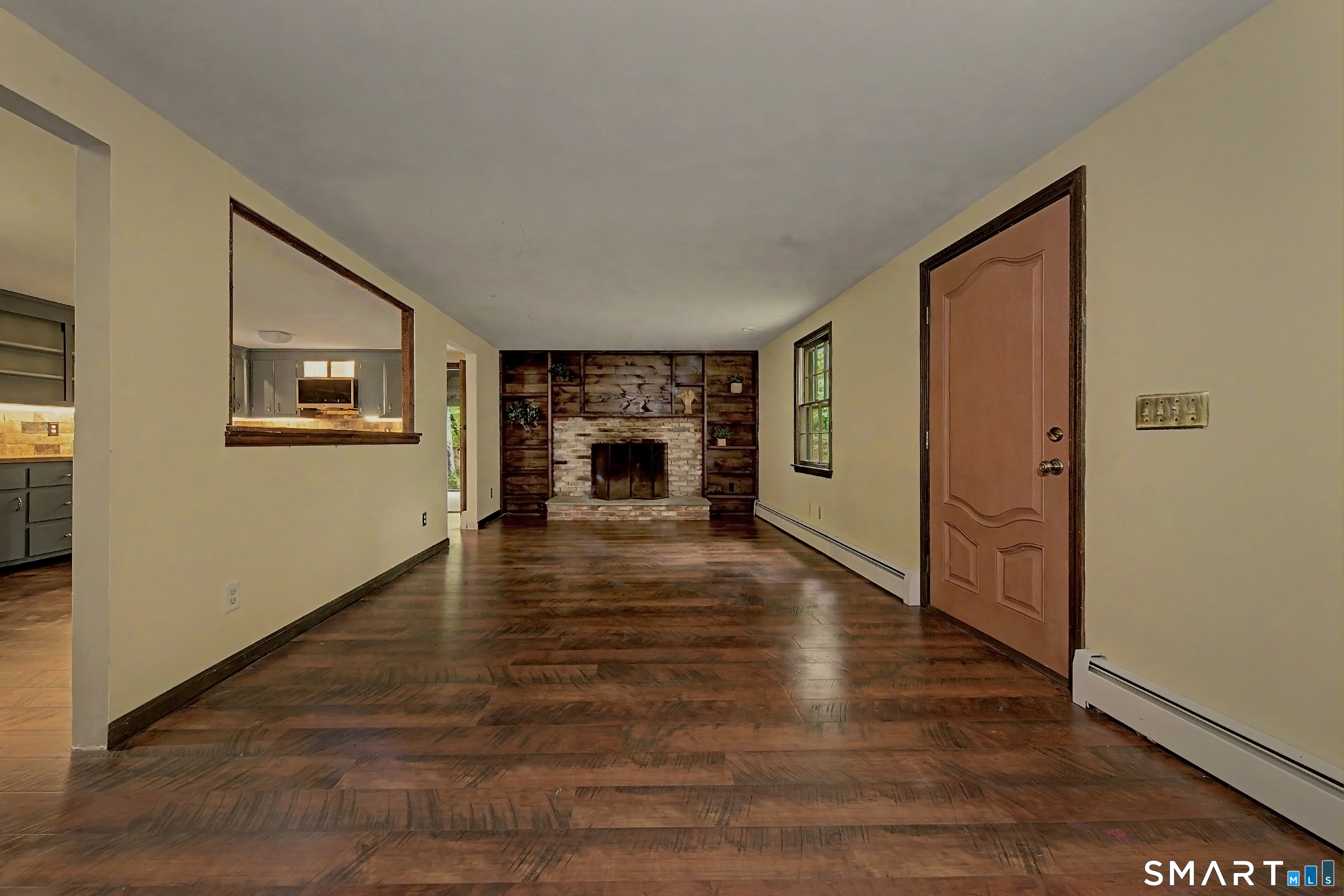 216 Reservoir Road Killingworth, CT 06419 - Photo 4 of 36 Built in book cases add to this cozy room.