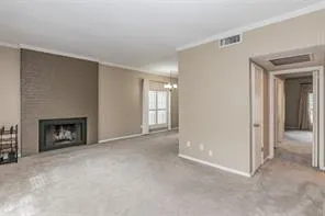 a view of a livingroom with a fireplace
