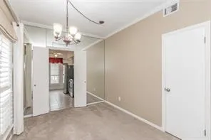 a view of a chandelier in a room